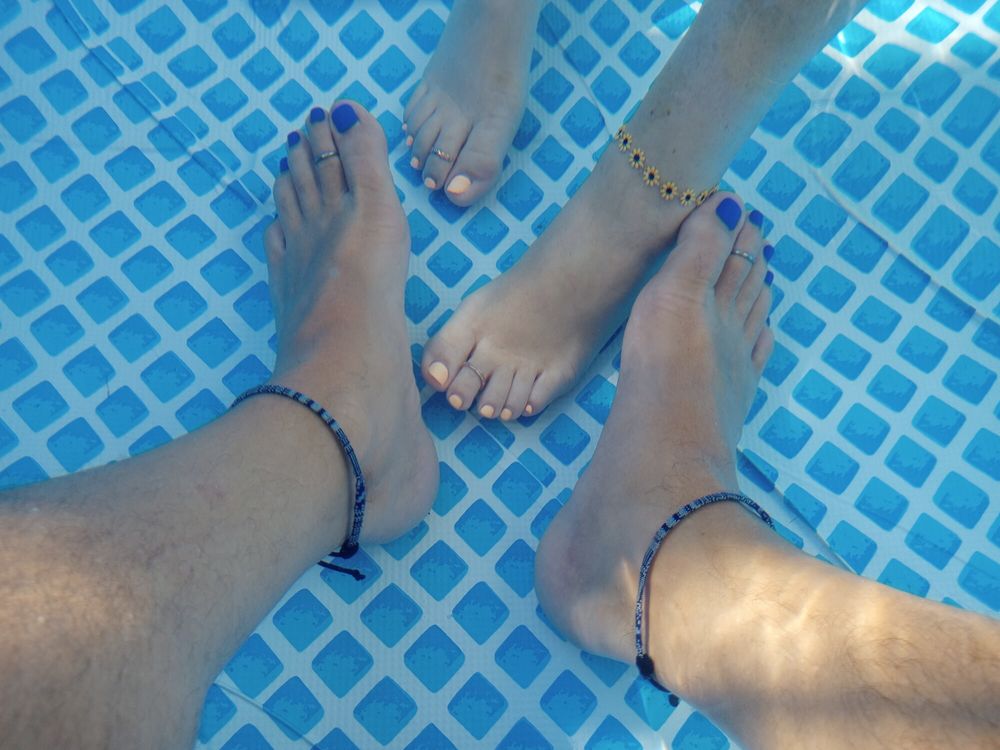 Showing off our pedicures in the pool #12