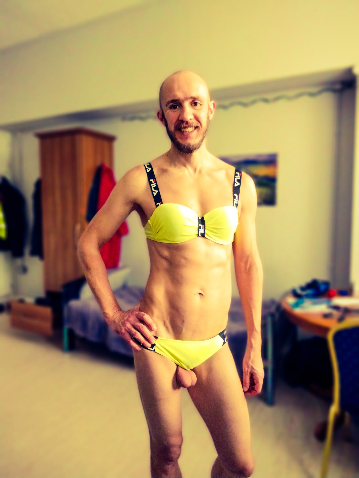Bearded athletic man posing in yellow swimsuit  #9