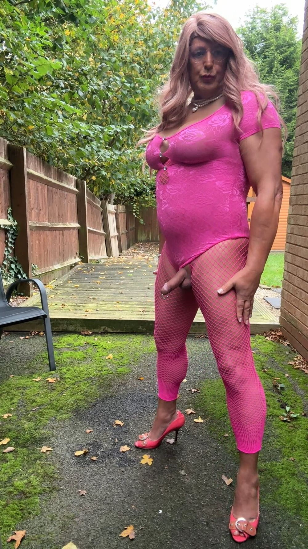 Crossdresser kellycd2022 in pink playsuit and fishnets  #19