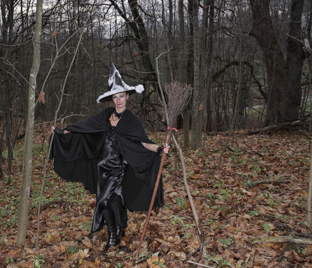 Witch with broom in forest #48