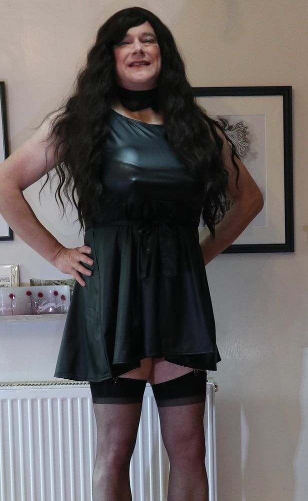 sissy in black stockings and short dress #4