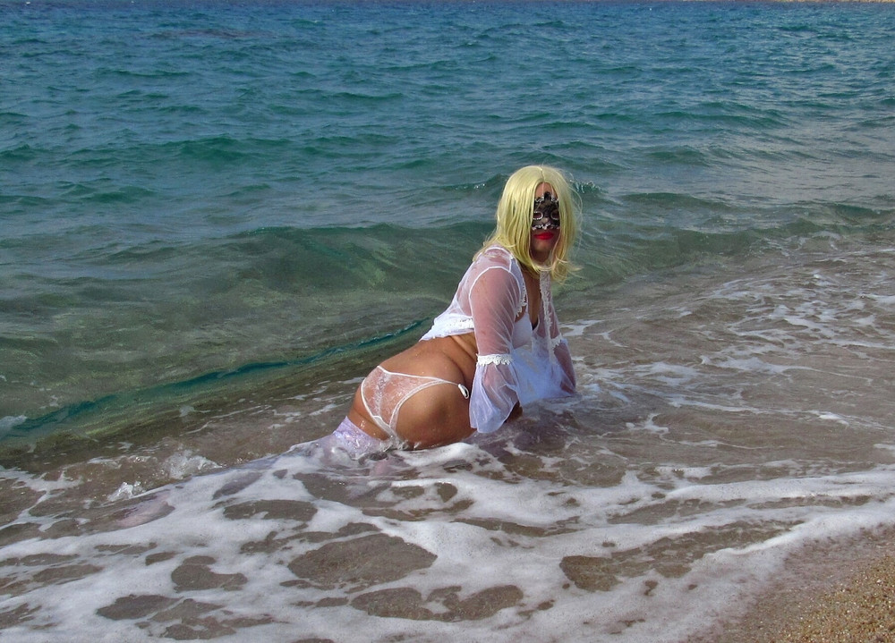 Sexy MILF Blonde shows off her ass on the beach. #35