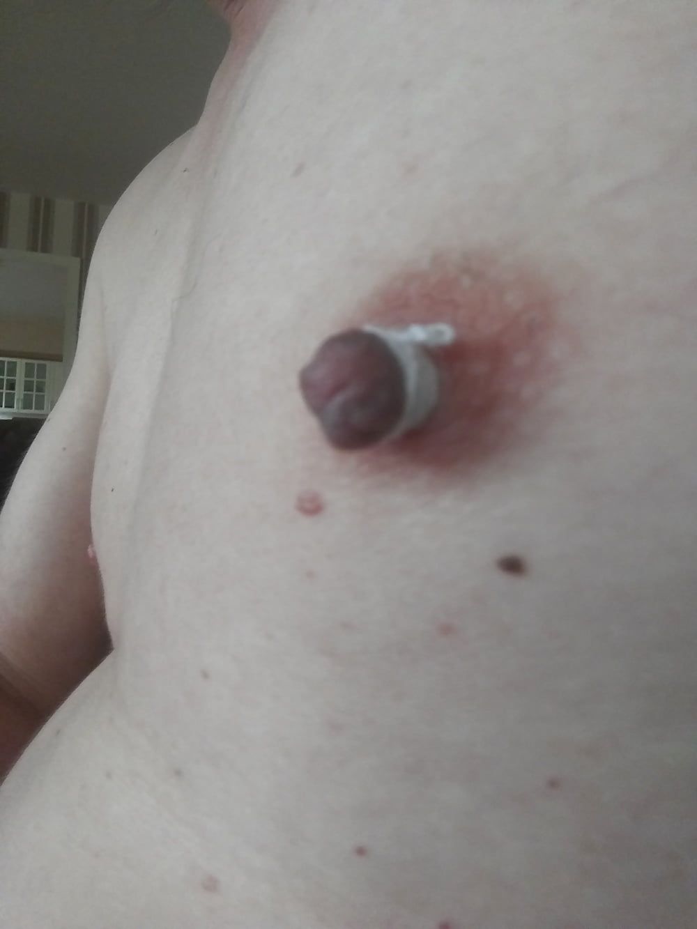 some more needles in my nipples #15