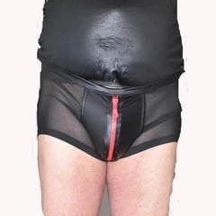 DRESSED IN A TIGHT NYLON SHORTS.