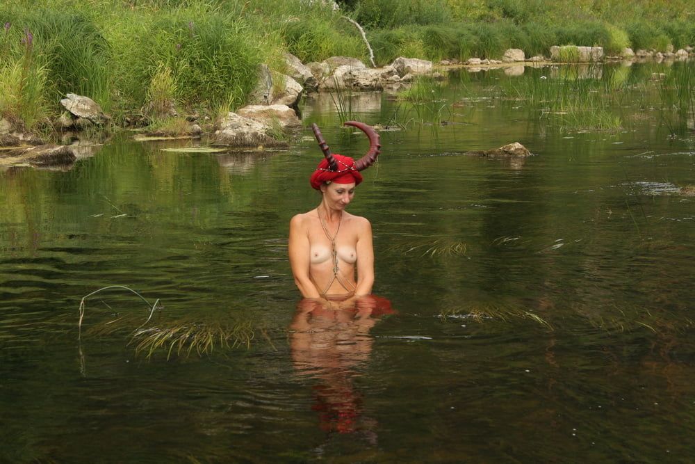 With Horns In Red Dress In Shallow River #47