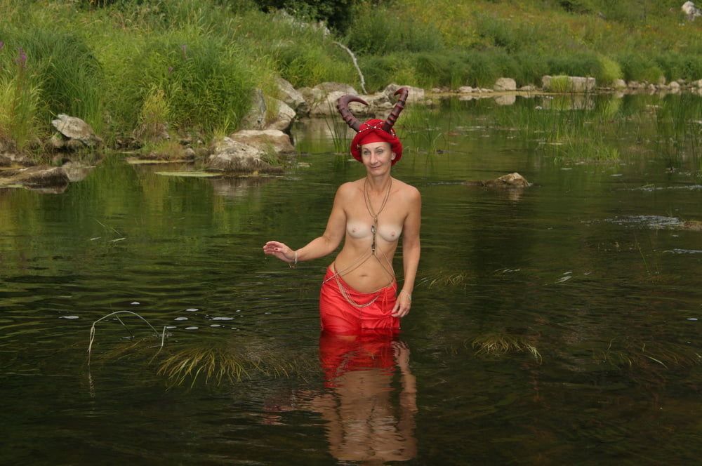 With Horns In Red Dress In Shallow River #20