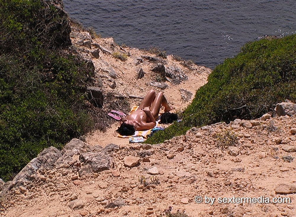 Bruinette alone naked while sunbathing #12