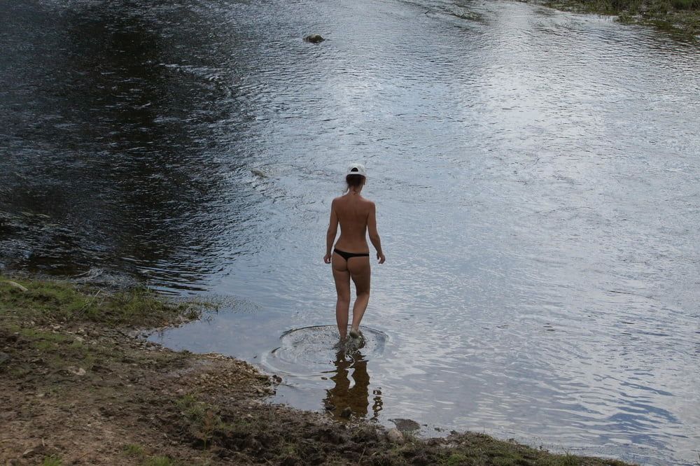 Nude in river's water #52