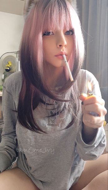 Cute Egirl smoking and showing her titties