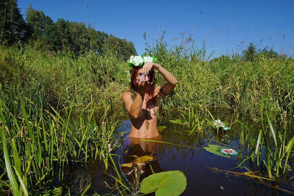 In pond with waterflowers #21