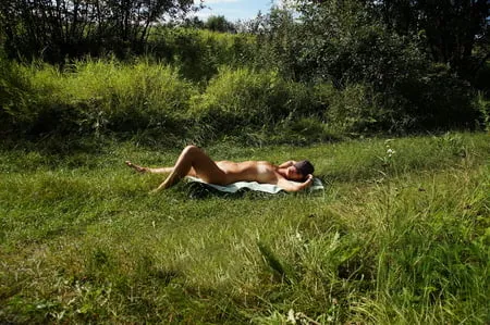 nude on green grass         