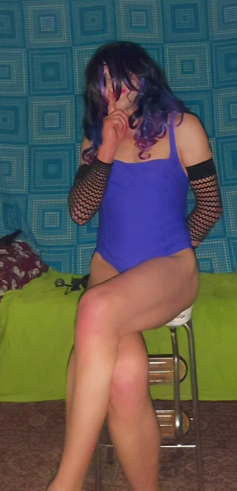 Purple swimsuit and wand album #52