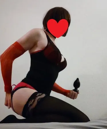 cd in tight black dress playing with plugs         