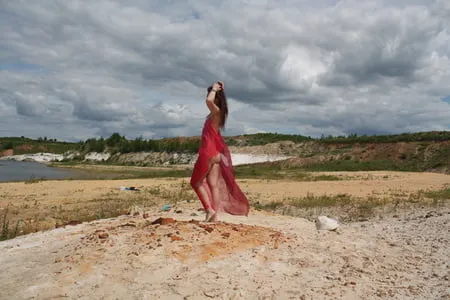 red shawl on white sand         