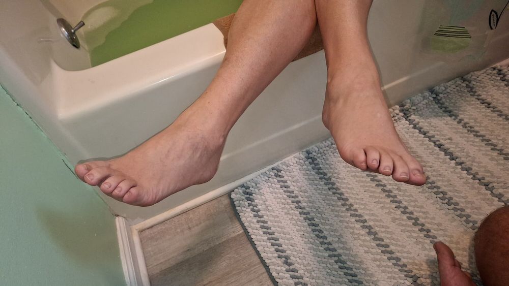 Showing off her soles and toes #3