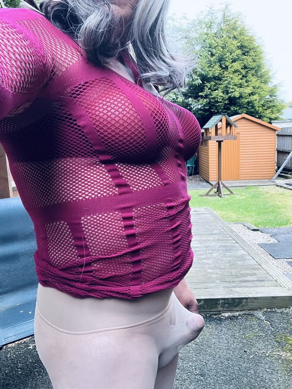 Amateur crossdresser Kelly cd in pink fishnet dress  #14