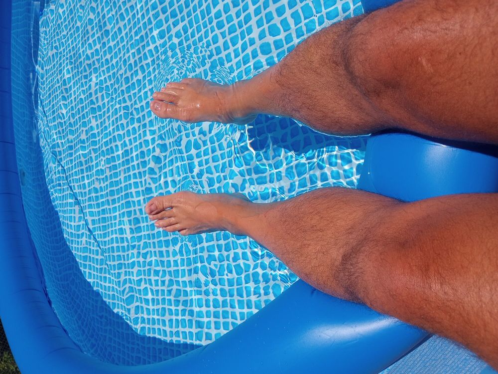 My bare feet and hairy legs getting a tan #3