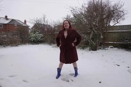 pregnant flashing naked in the cold snow         