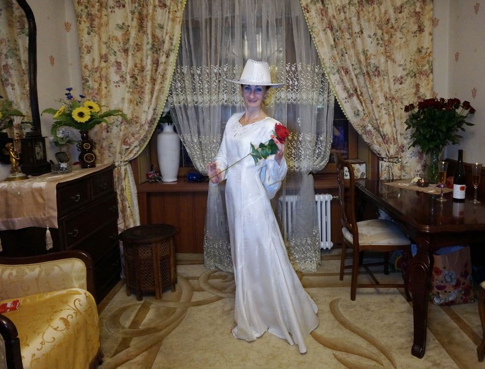 In Wedding Dress and White Hat #25