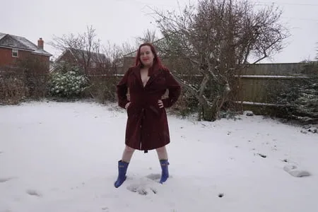 pregnant flashing naked in the cold snow         