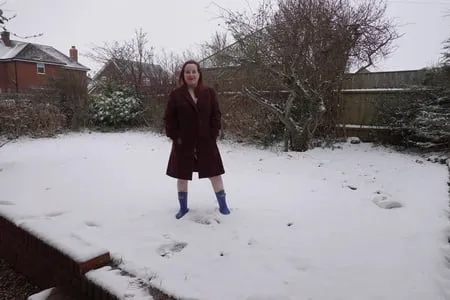 pregnant flashing naked in the cold snow         