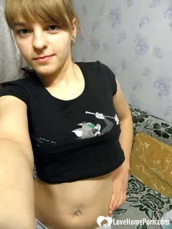 hot teen taking some selfies at home         