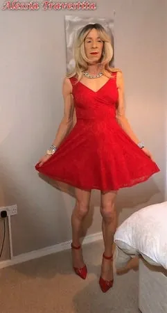    alessia travestita in flirty red dress         