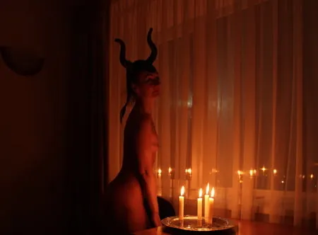 naked maleficent with candles         