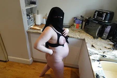 pregnant wife in muslim niqab and nursing bra         