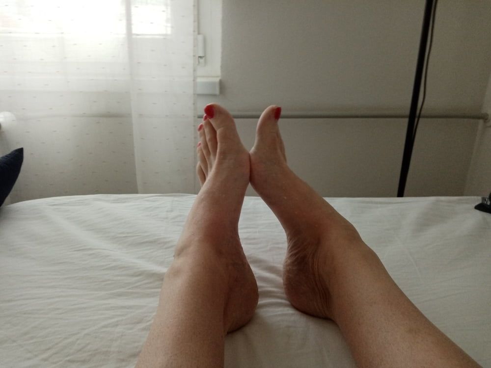 bare smooth slender legs with red painted toes #4