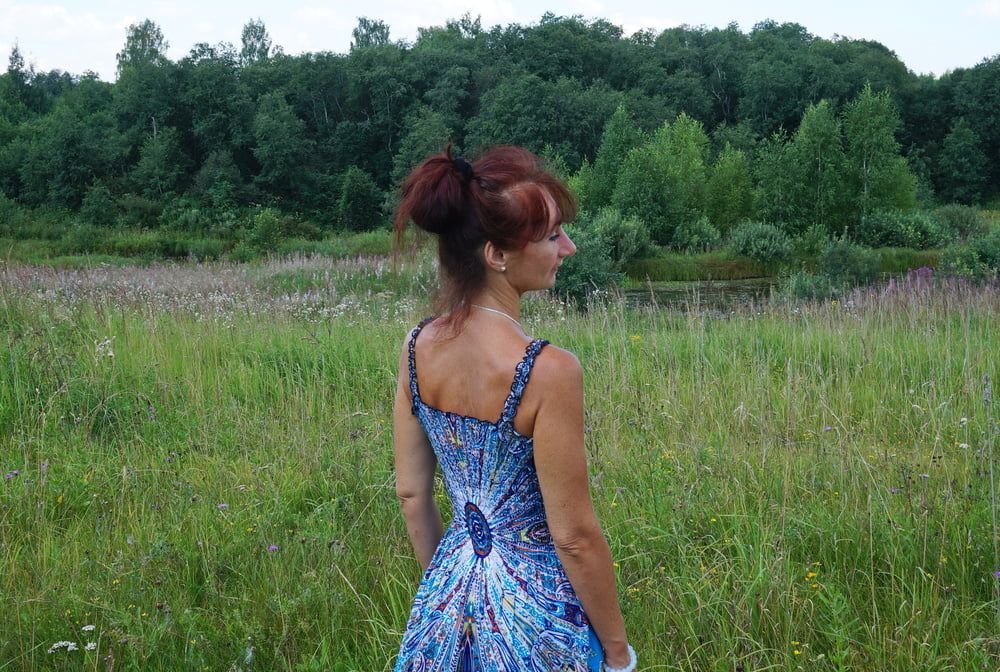 In blue dress in field #36