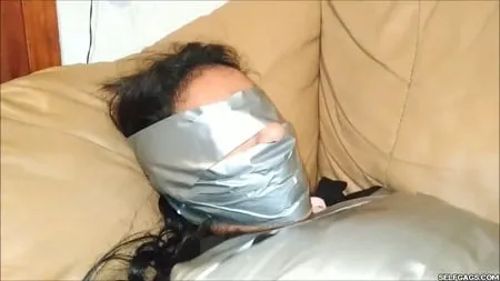 Gagged girl duct tape wrapped up tight selfgags         