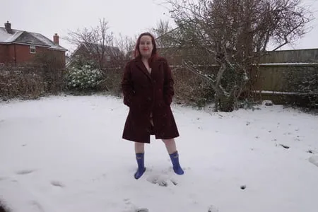 pregnant flashing naked in the cold snow         