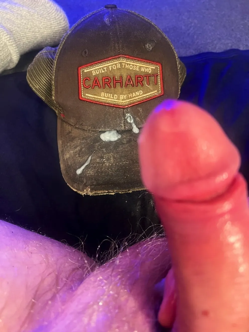 Jizz tagging a Carhartt Cap #58