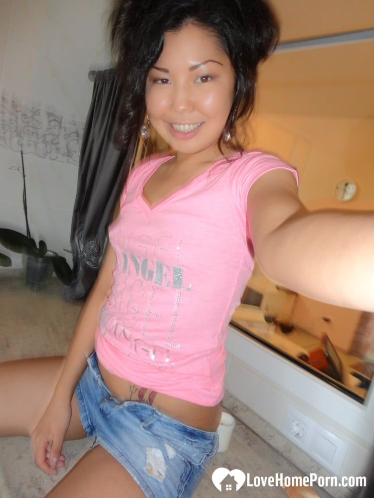 Naughty Asian teasing all around her apartment #17