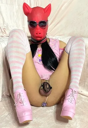 sissy wearing a pink dress heels and chastity cage pt           