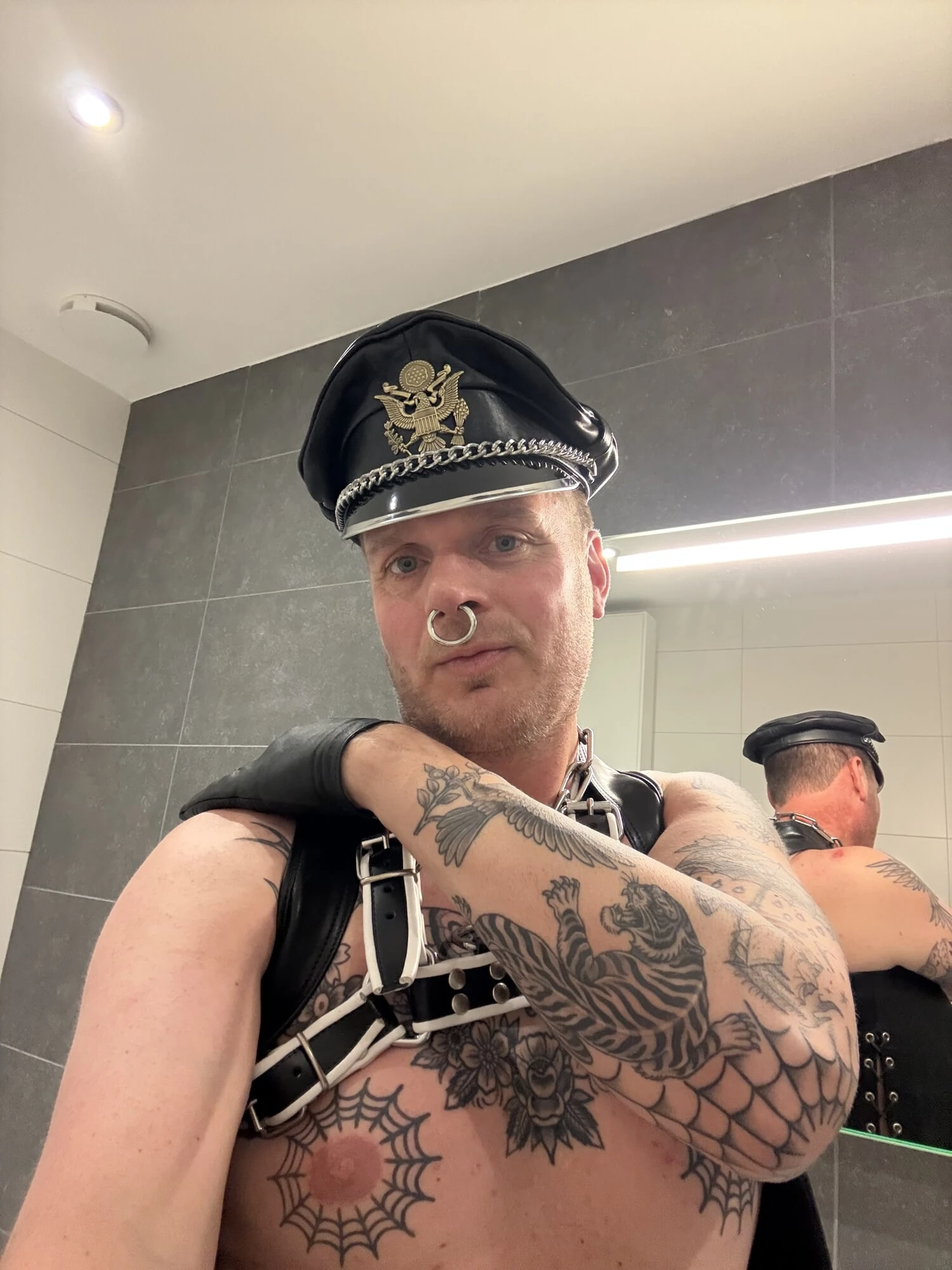 Leatherstudx heavy tattooed and pierced 😈