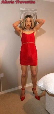    alessia travestita in red velvet dress         