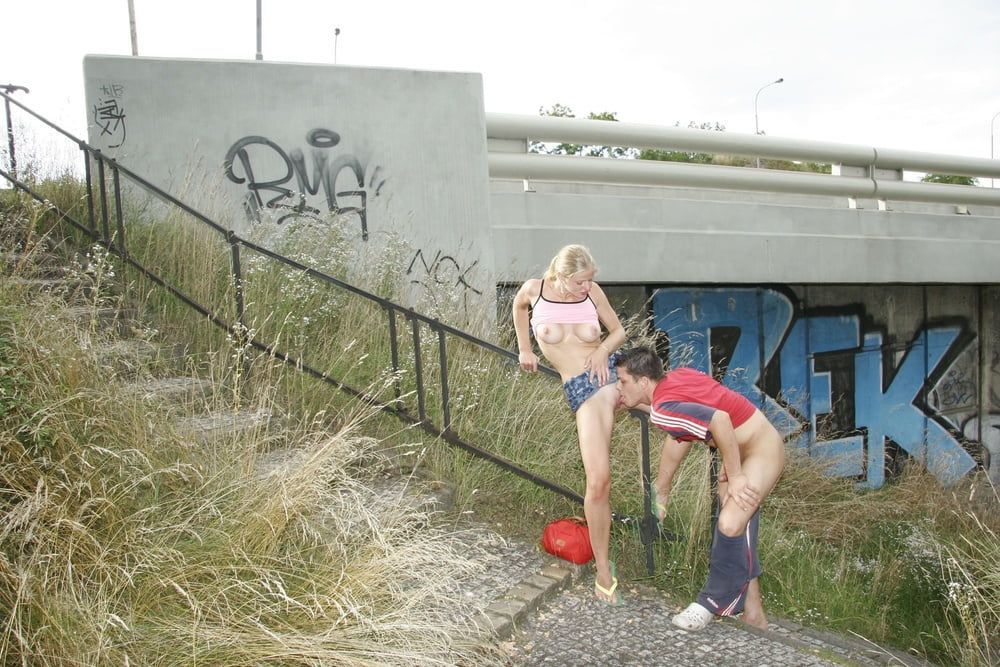 Two young exhibitionists enjoy fucking around the city #22