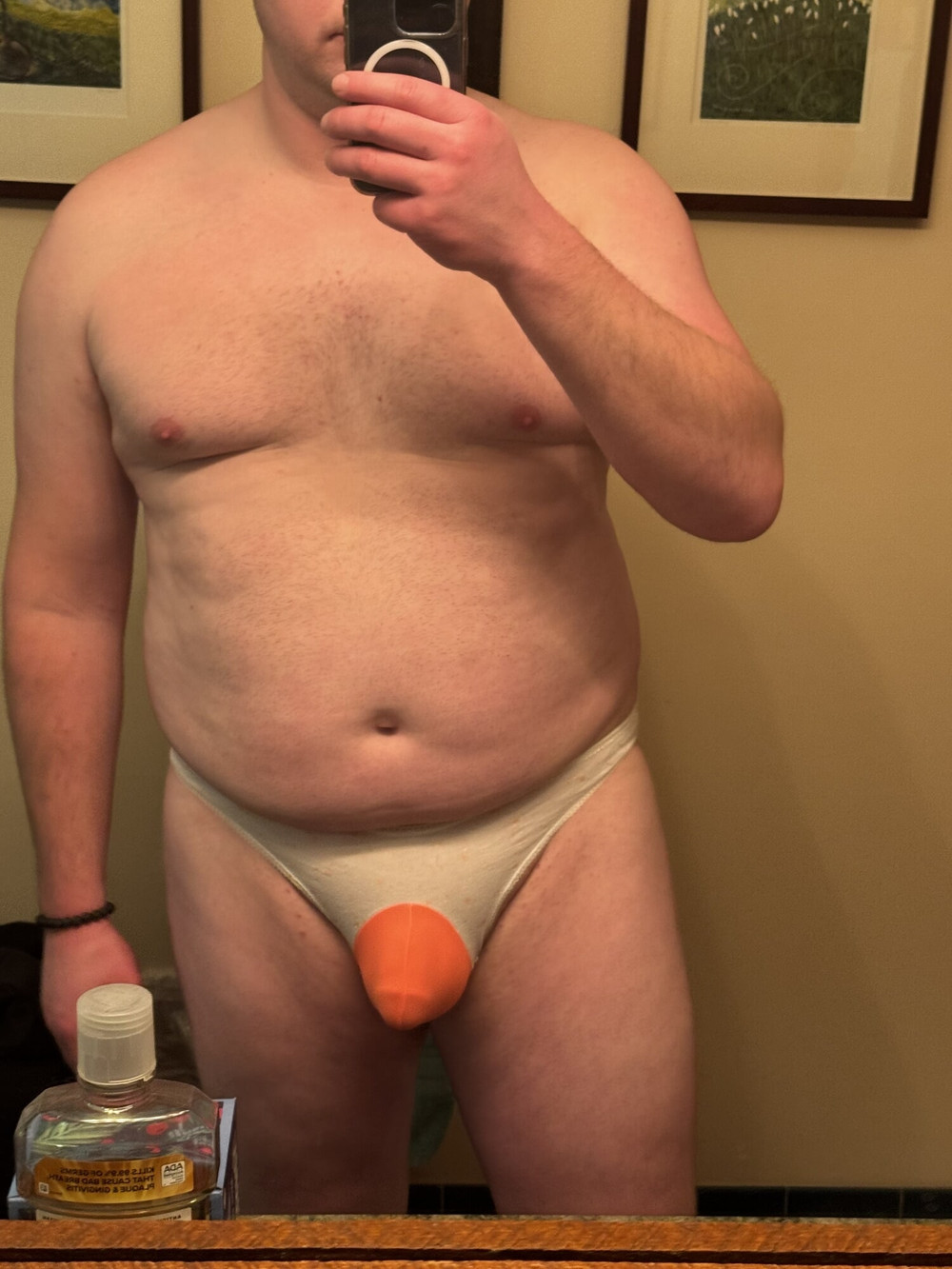 Fat man thong try on