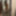 Tanned girl posing nude in the mirror