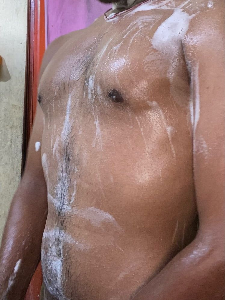 Indian boy talking shower