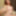 Redhead cutie shows off outfits and gets nude