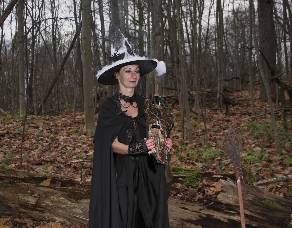 Witch with broom in forest #23