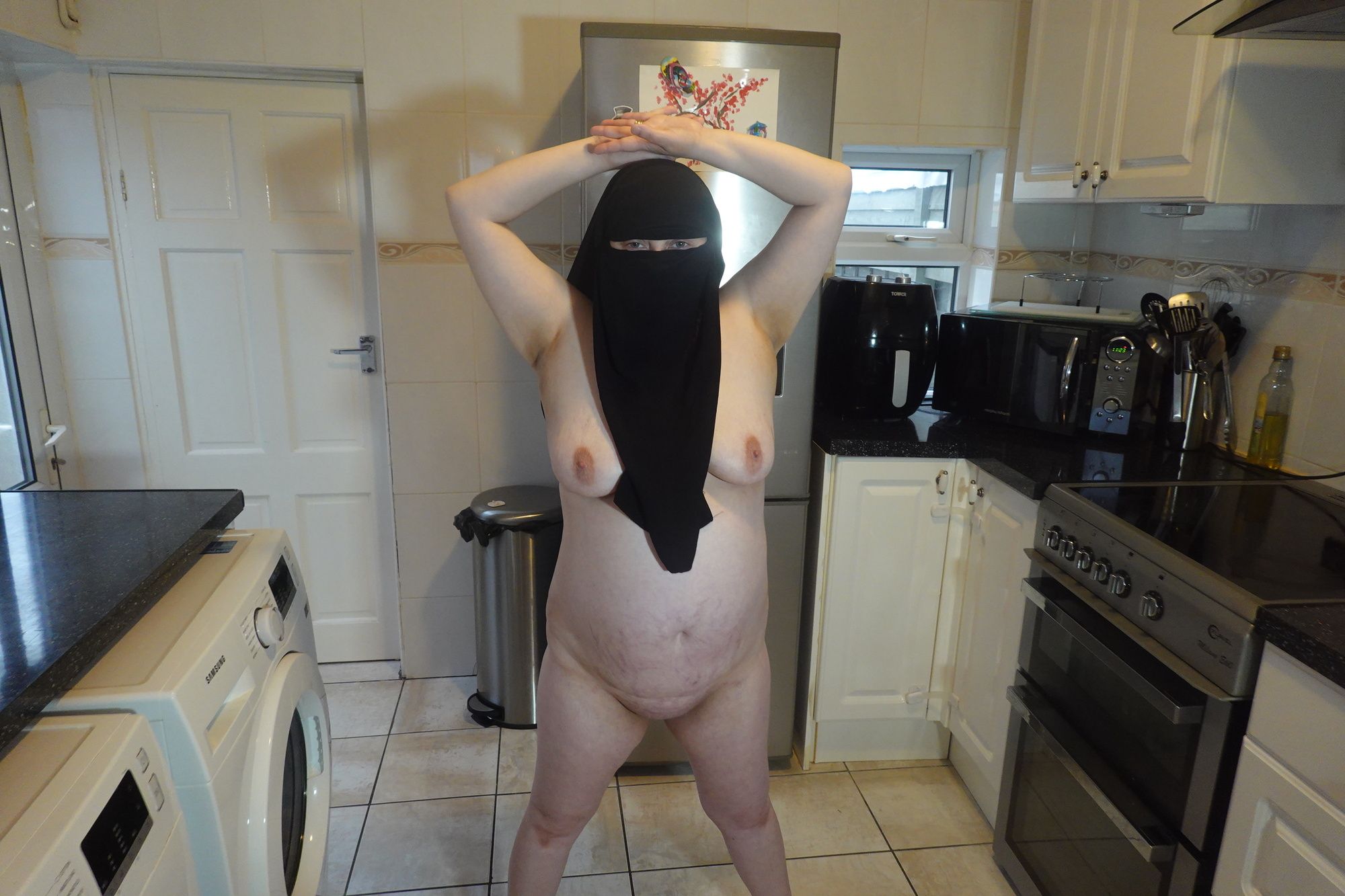 Posing fully nude in Niqab #25