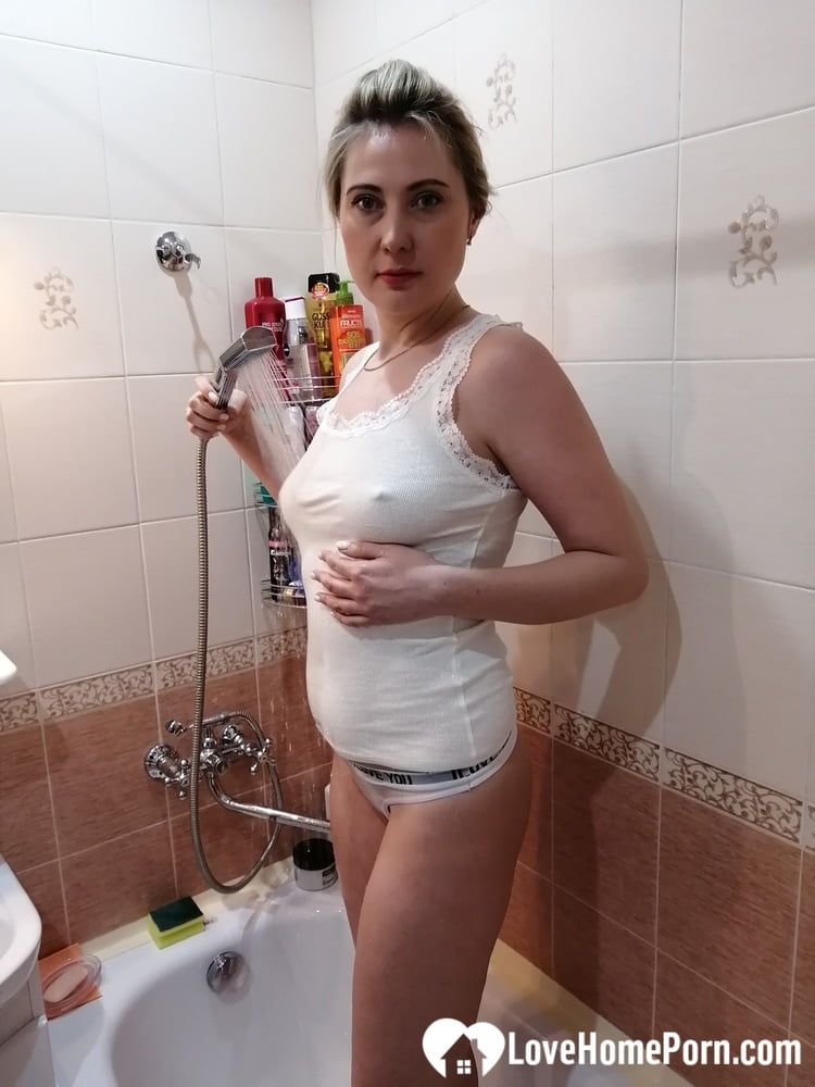 Naughty MILF masturbating during her hot bath #37