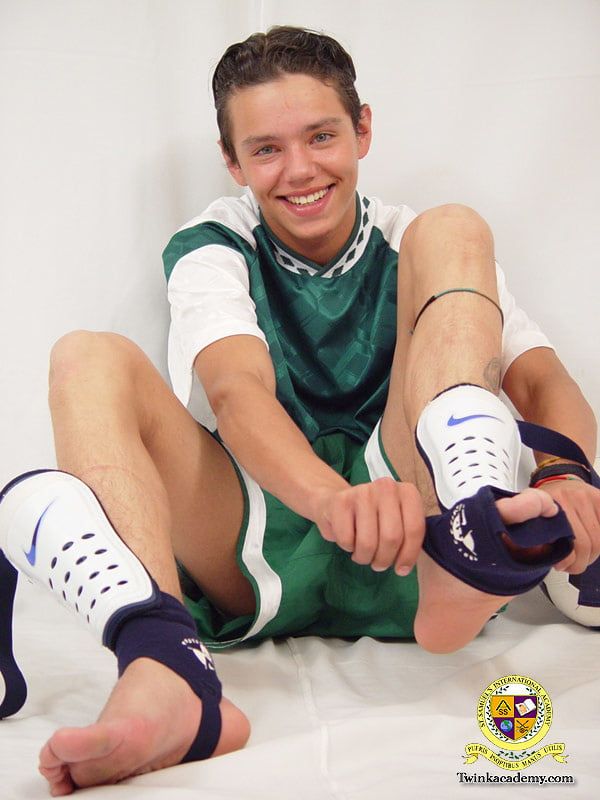Latino twink Gabriel poses in his soccer kit #8