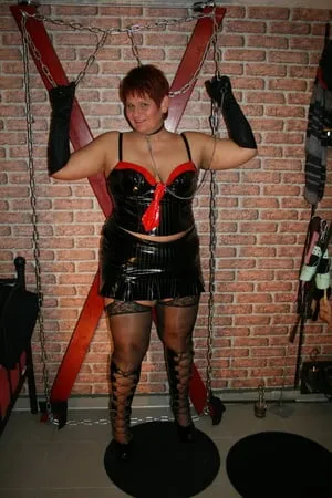 in latex paint outfit on the cross         