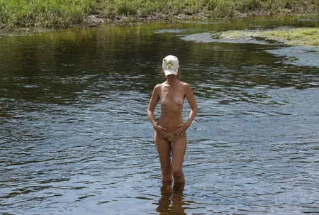 nude in rivers water         