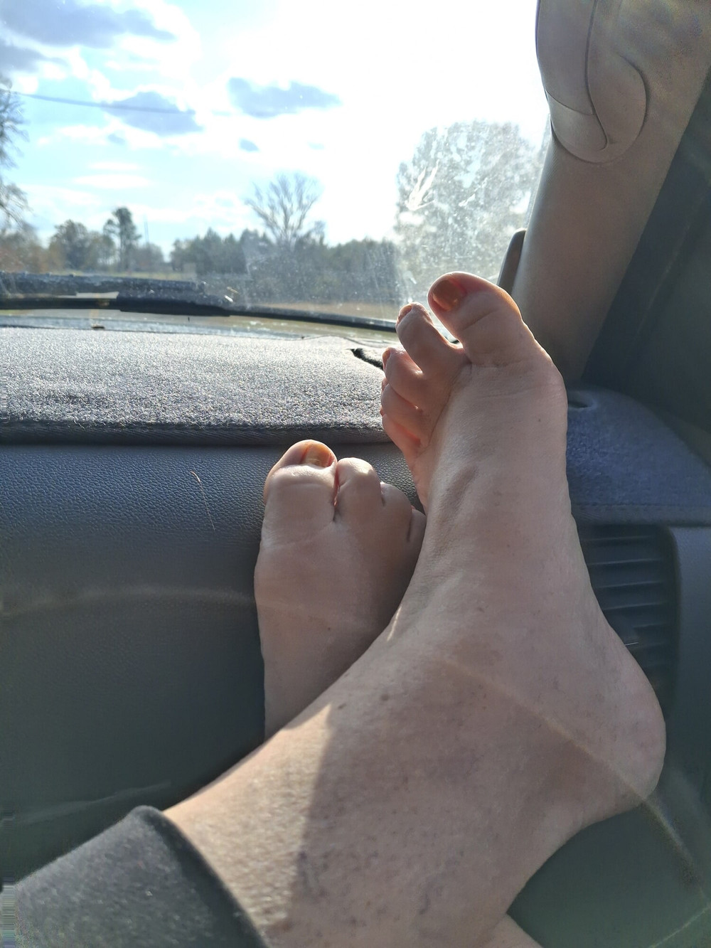She puts her sexy feet on my dash #13